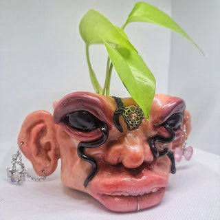 Creepy handmade face flowerpot