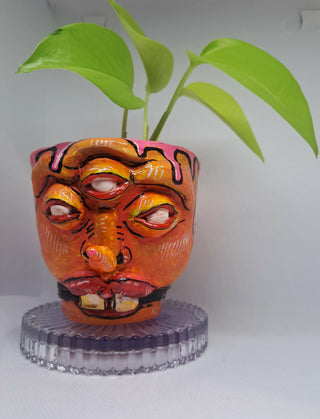 Hues and blooms -Offbeat Orange- Unique hand sculpted indoor flowerpot