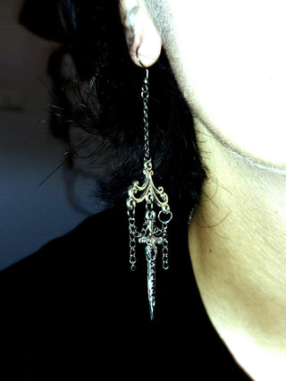 Earrings with chains and dagger pendant